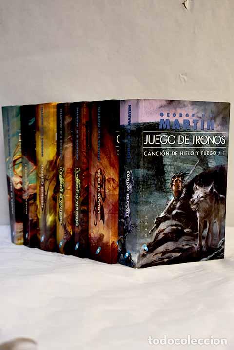 books: Canci&oacute;n de hielo y fuego:: Juego de tronos; Choque de reyes; Tormenta de espadas; Festin de cuervos