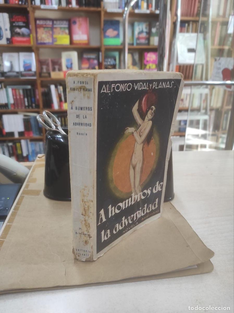 Livres: A HOMBROS DE LA ADVERSIDAD