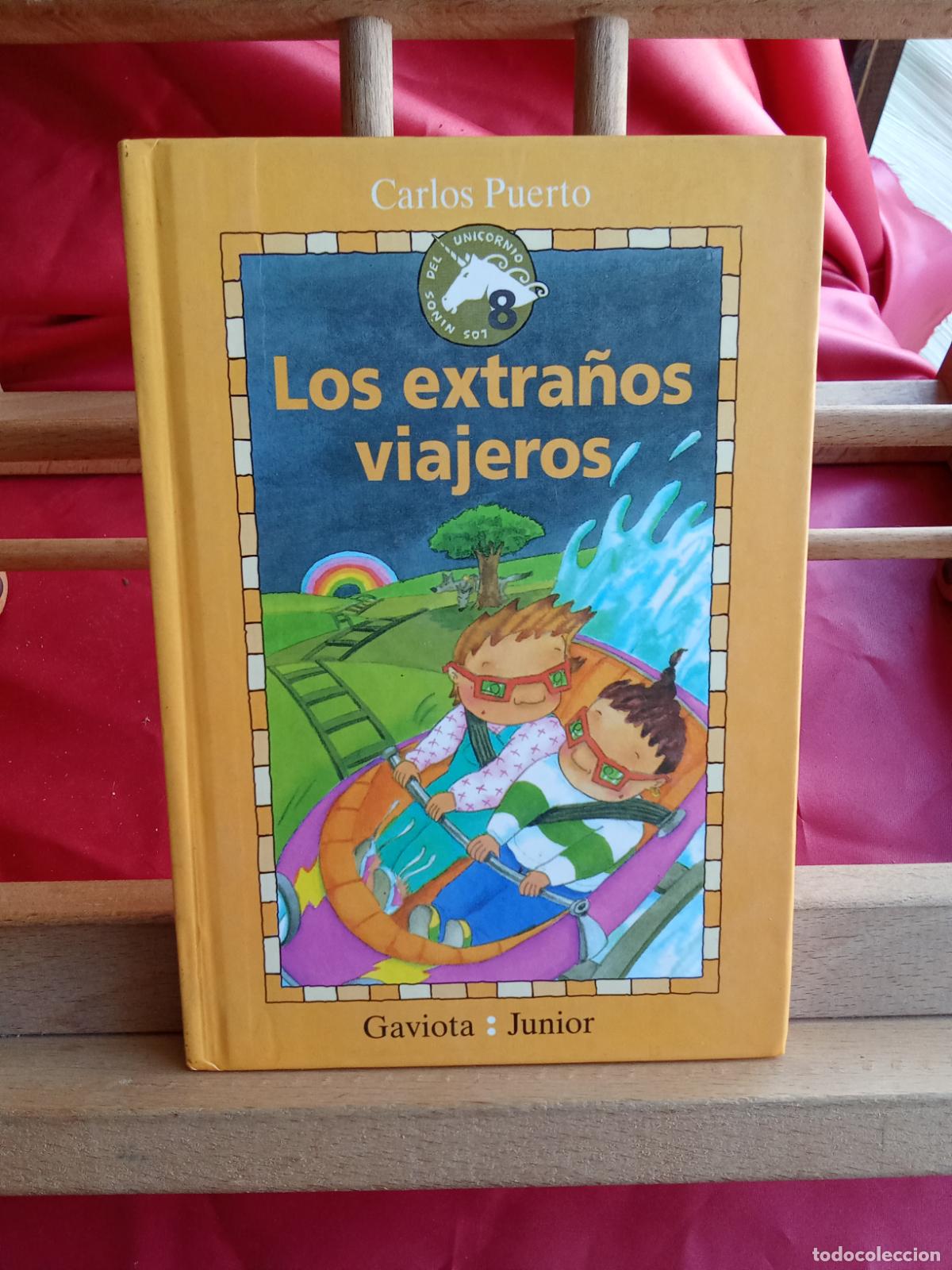 Libros: Los extra&ntilde;os viajeros. Carlos Puerto L.22975-1216