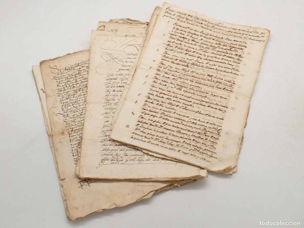 Libri di seconda mano: 14 documentos manuscritos referidos a la villa de Viana, Navarra. Uno de ellos referidos a los biene