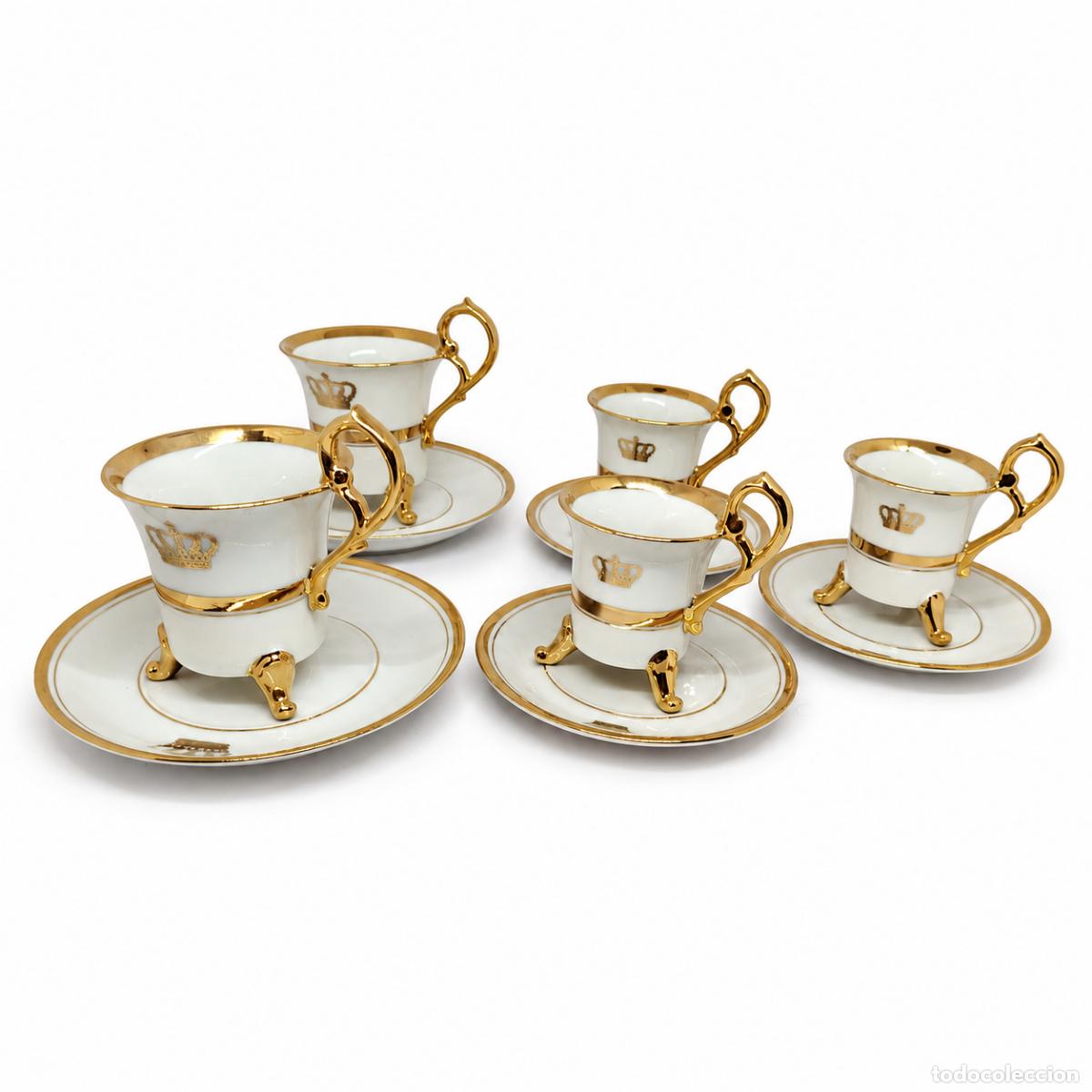 books: Juego de porcelana Ohashi: cinco tazas y cinco platillos