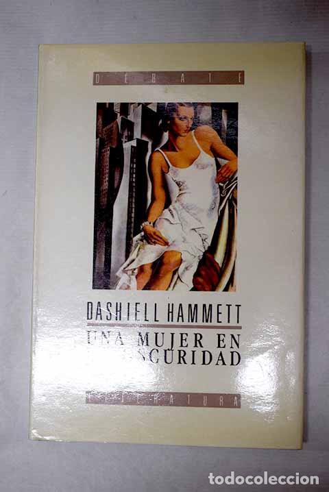 B&uuml;cher: Una mujer en la oscuridad: novela de un idilio peligroso.- Hammett, Dashiell