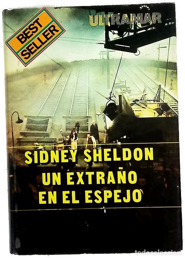 Libros: Un extra&ntilde;o en el espejo - Sheldon, Sidney