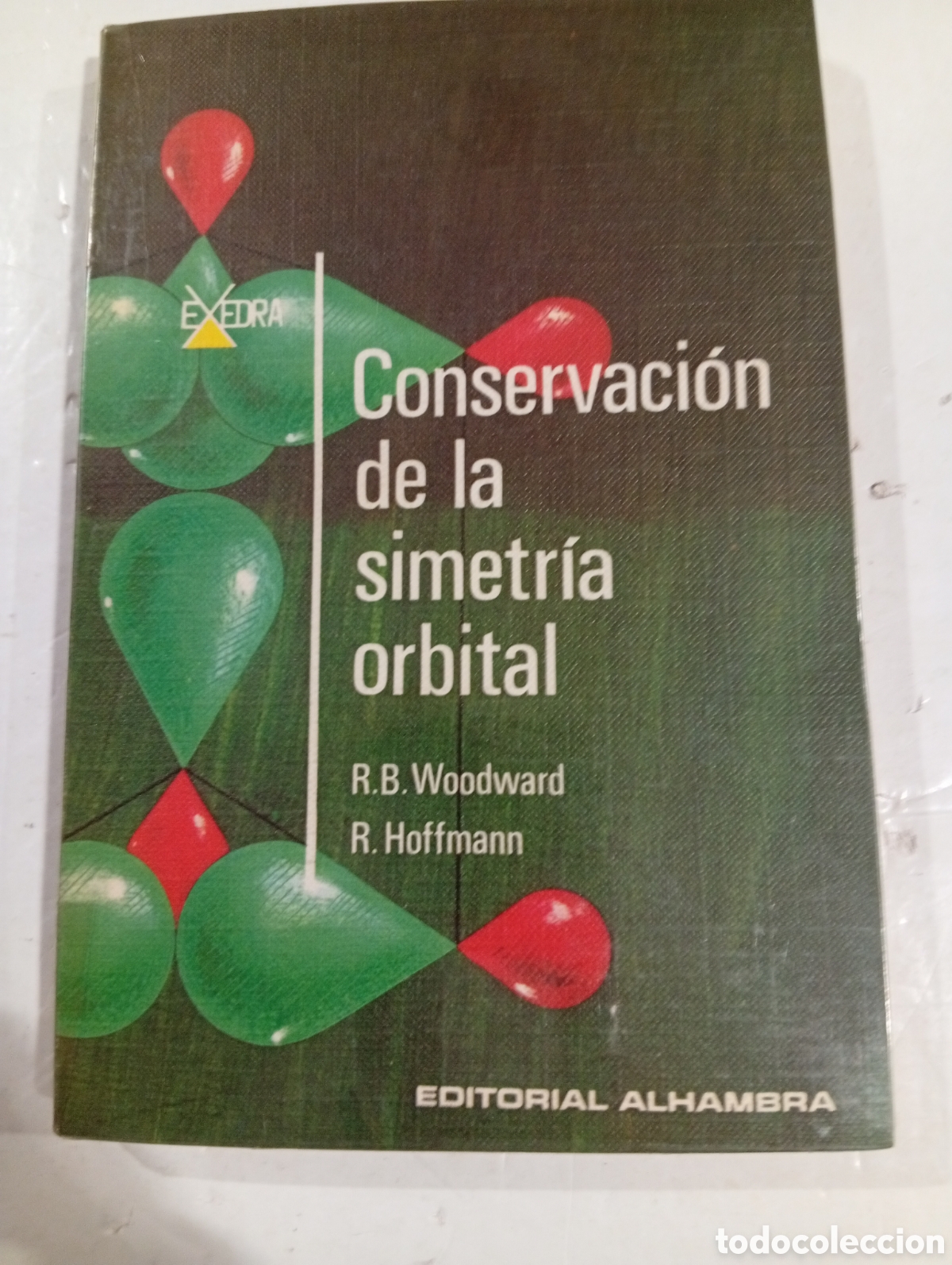 Livros em segunda m&atilde;o: Conservaci&oacute;n de la simetr&iacute;a orbital R.B. Woddward R. Hoffman