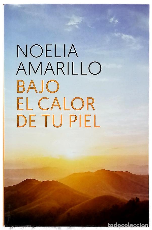 B&uuml;cher: Bajo el calor de tu piel - Amarillo, Noelia
