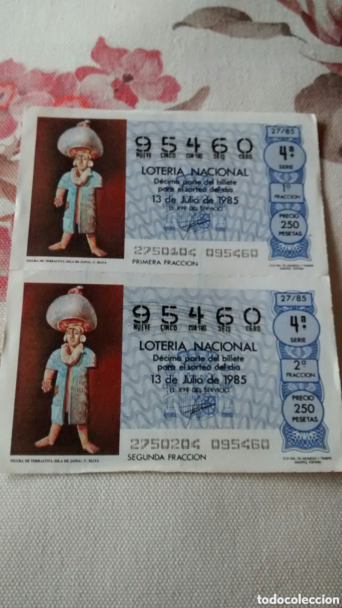 National Spanish Lottery: 2 DECIMOS DE LA LOTERIA NACIONAL. SORTEO 13 DE JULIO 1985 27/85 FIGURA DE TERRACOTA. ISLA DE JAINA.