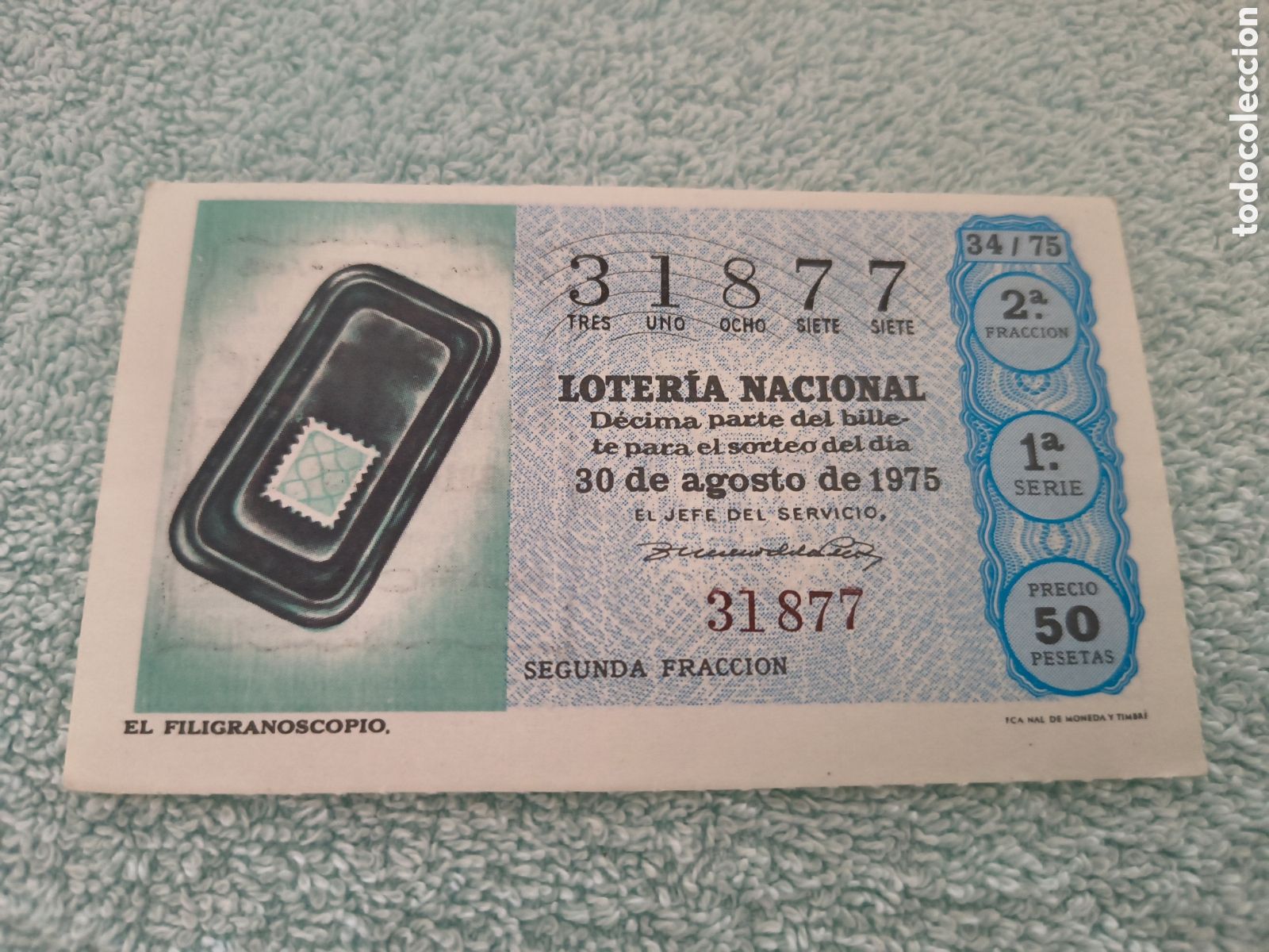 Loter&iacute;a Nacional: DECIMO DE LA LOTERIA NACIONAL. SORTEO 30 AGOSTO 1975 34/75 EL FILIGRANOSCOPIO