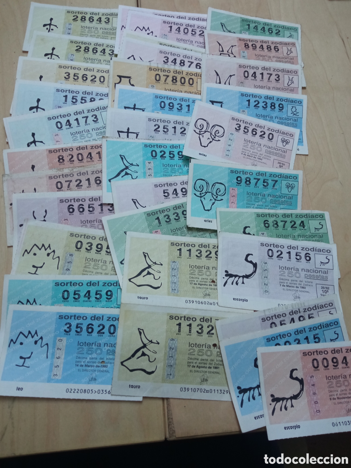 Loter&iacute;a Nacional: 34 billetes loter&iacute;a Nacional. Sorteo del zod&iacute;aco..A&ntilde;os 1991/1992.