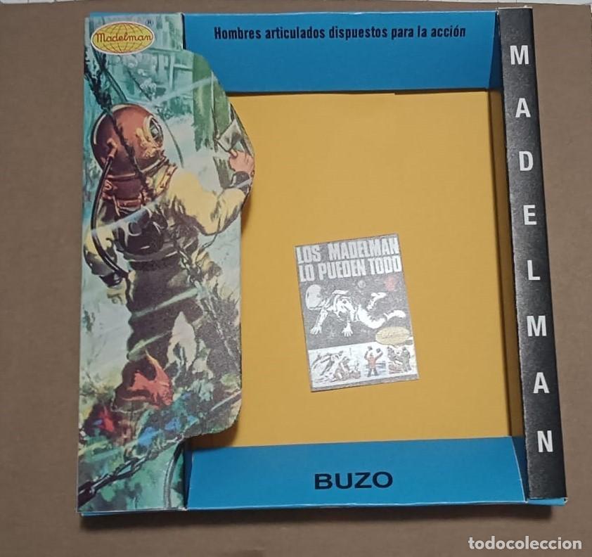 Madelman: Madelman. R&eacute;plica caja VAC&Iacute;A Equ. B&aacute;s. BUZO de primera generaci&oacute;n