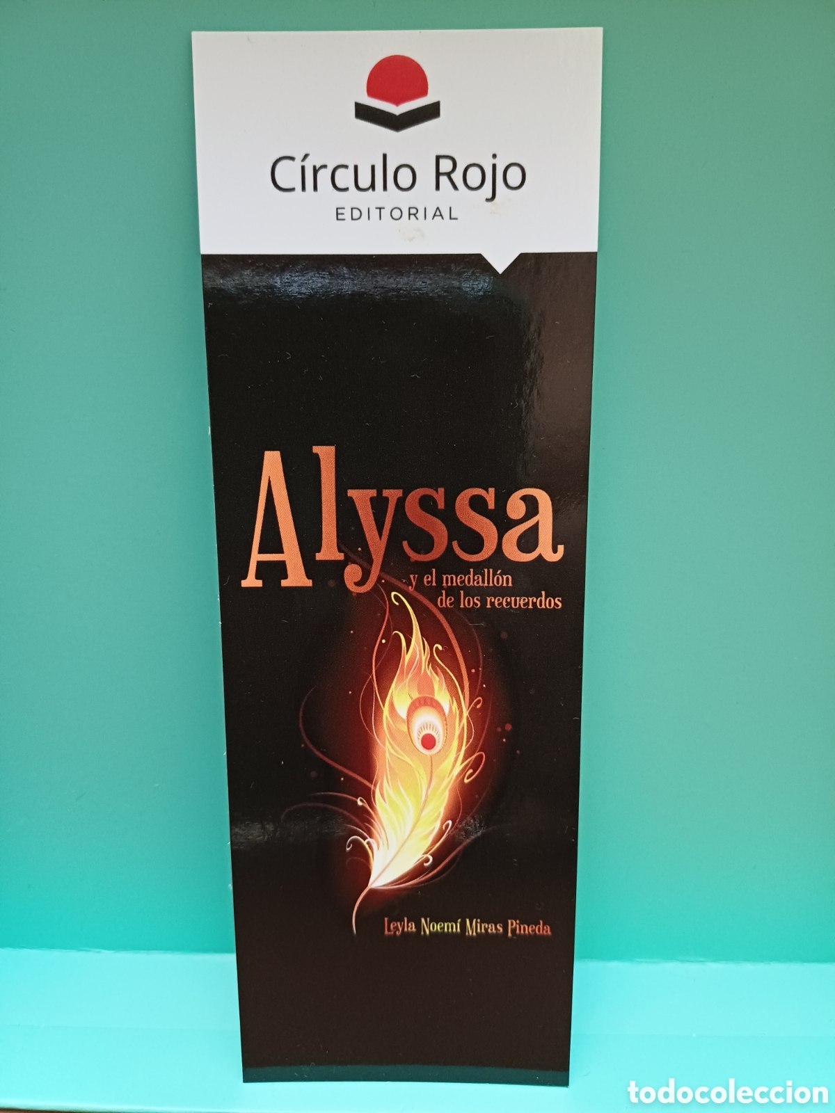 Sammeln von Lesezeichen: Marcap&aacute;ginas Alyssa y el medall&oacute;n de los recuerdos