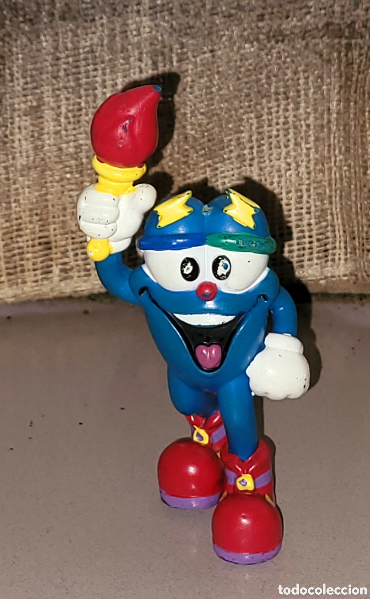 Coleccionismo deportivo: Bonita figura pvc goma de Izzy, la mascotaJJOO Atlanta 1996, antorcha olimpica