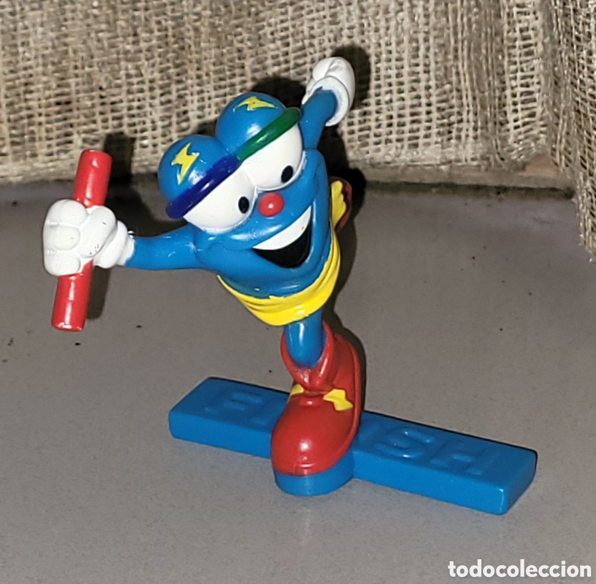 Coleccionismo deportivo: Bonita figura pvc goma Izzy, mascota JJOO de Atlanta 1996, cruzando la meta