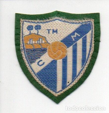 Sammelleidenschaft Sport: ANTIGUO PARCHE DE SEDA Y FIELTRO, ESCUDO DEL CLUB DEPORTIVO - T M - C. M. MALAGA. 6 X 6,5 CM.