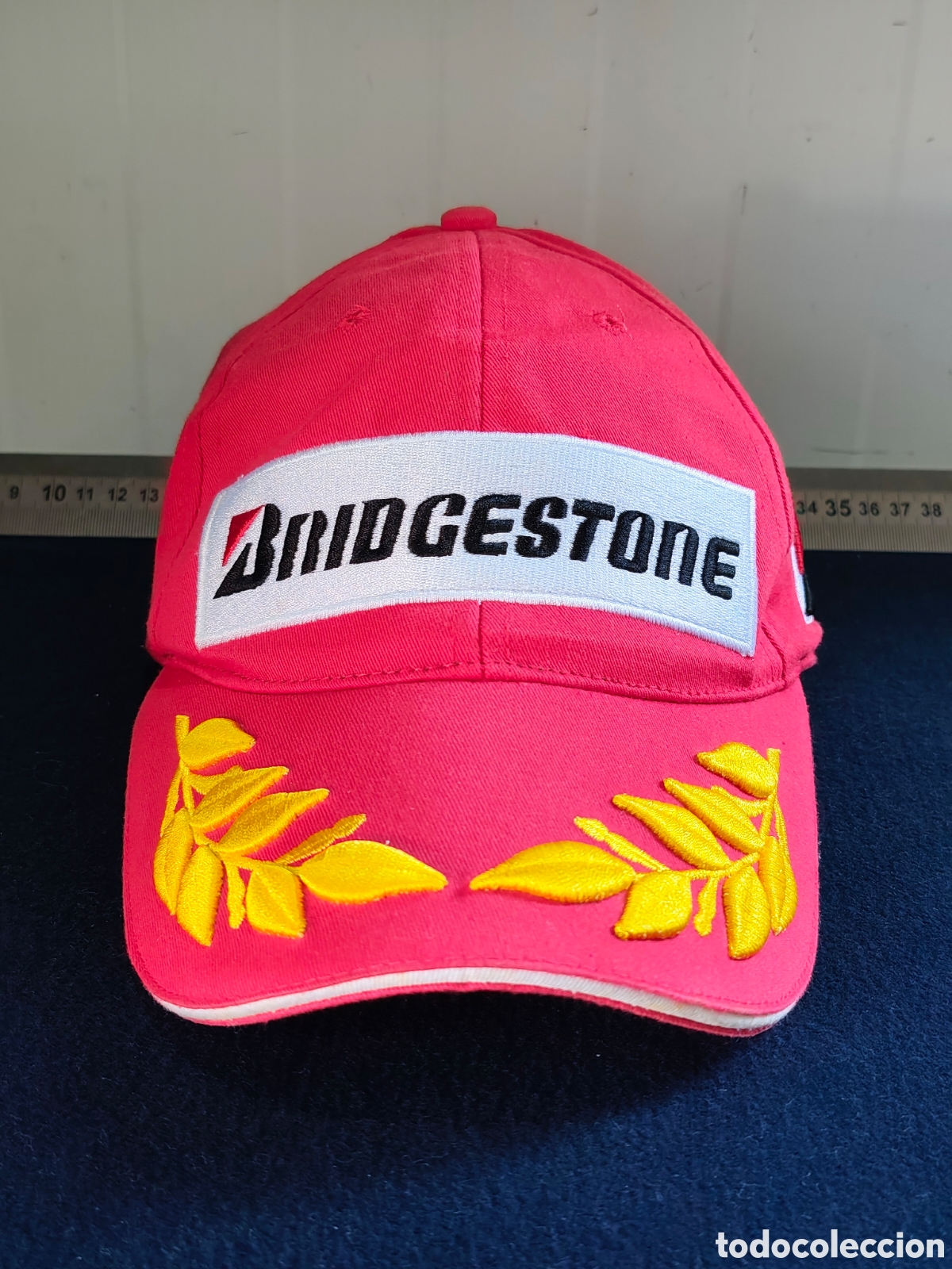 Coleccionismo deportivo: Gorra Oficial Bridgestone F1 / Motorsport &ndash; Edici&oacute;n Podio Laurel (Original)