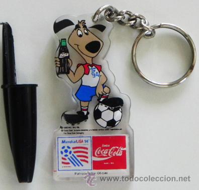 Coleccionismo deportivo: LLAVERO COCA COLA MASCOTA MUNDIAL DE F&Uacute;TBOL EEUU 1994 - DEPORTE ESTADOS UNIDOS 94 PERRO CON BOTELLA