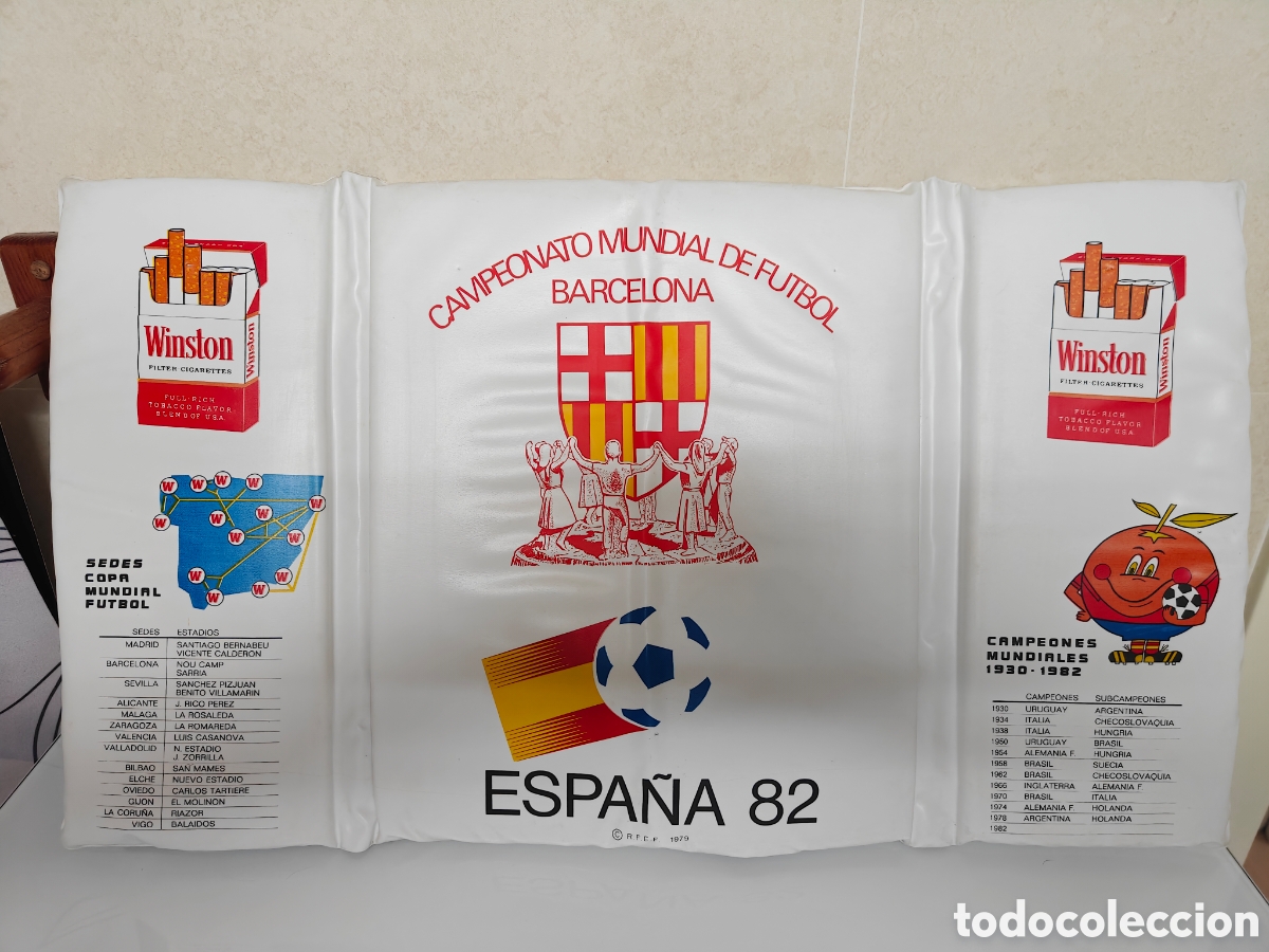 Coleccionismo deportivo: ALMOHADILLA ESPA&Ntilde;A 82' NARANJITO SEDES BARCELONA CAMP NOU FUTBOL PUBLI WINSTON