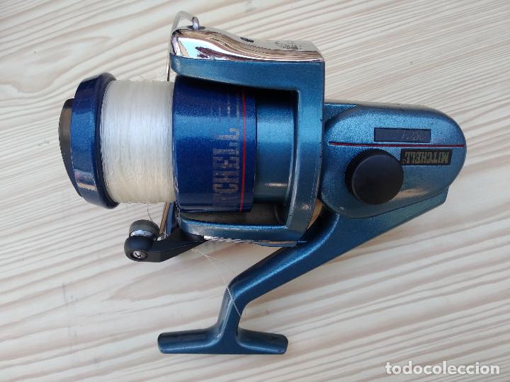 Coleccionismo deportivo: CARRETE MITCHELL ORCA 70 S
