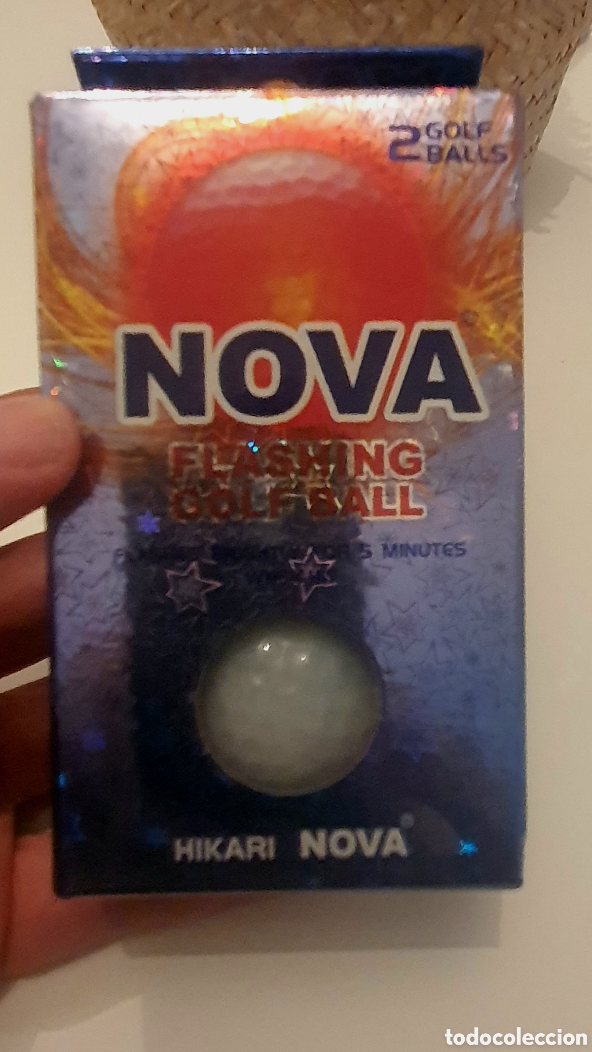 Collectionnisme sportif: Dos pelotas de golf se&ntilde;alizacion nocturna