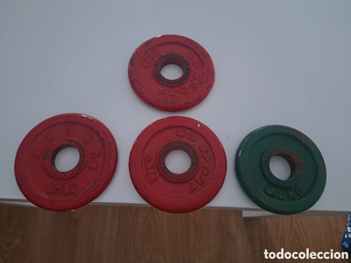 Collectionnisme sportif: 4 discos de hierro profesiones de 0.5