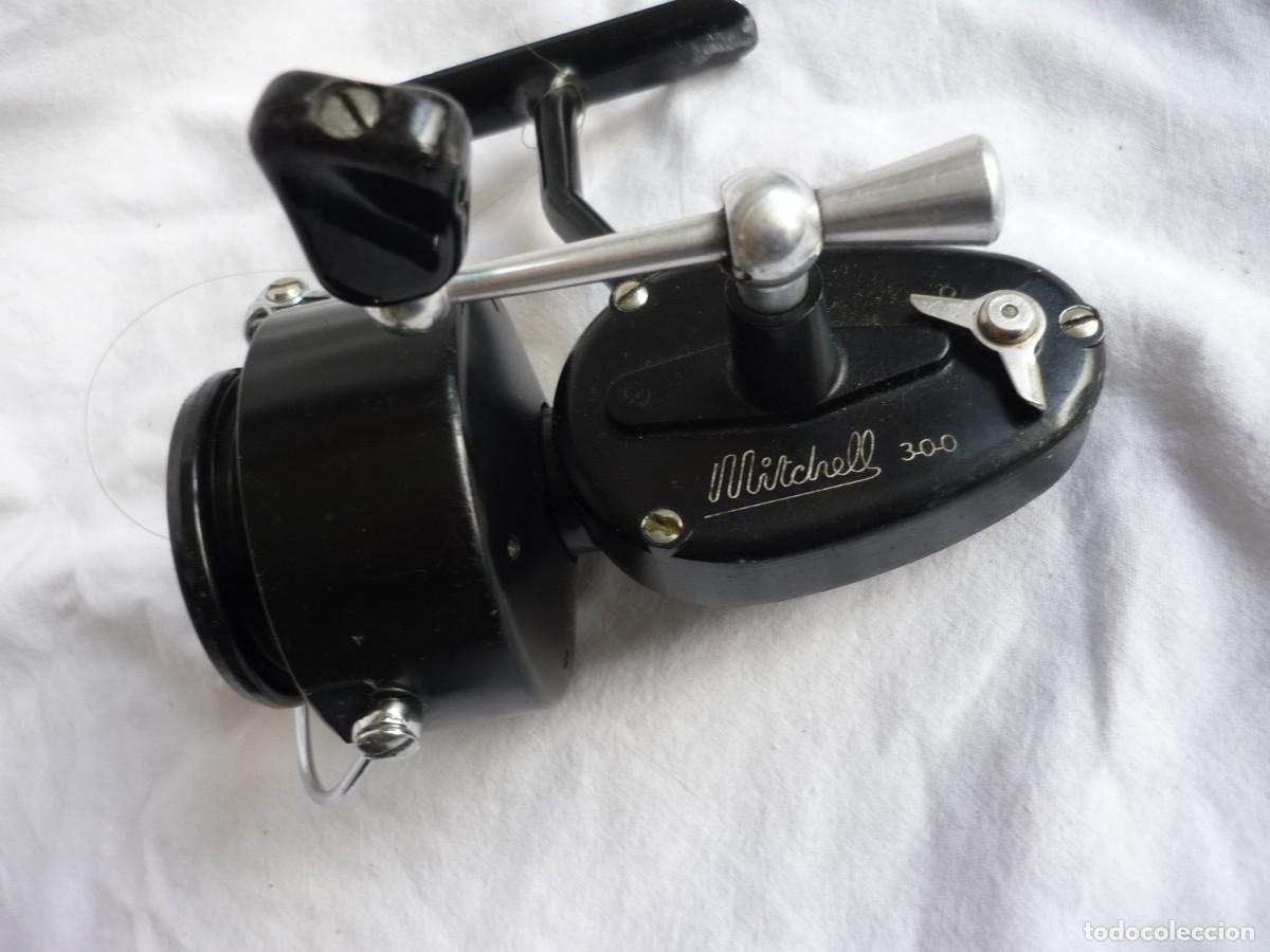 Coleccionismo deportivo: Carrete de pesca con bobina extra MItchell 300 funcionando - Foto 7