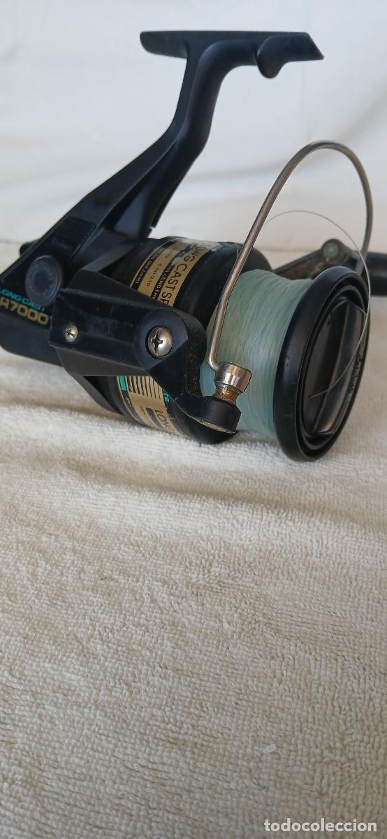 Coleccionismo deportivo: Carrete de pesca vintage Daiwa Long Cast H7000 (Grafito). Ver las fotos y la descripci&oacute;n!