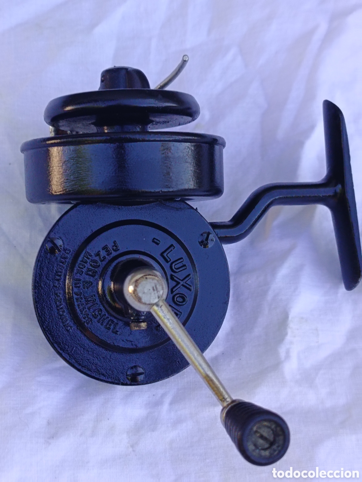 Coleccionismo deportivo: Carrete de pesca antiguo Luxor de la marca Pezon & Mitchell ,muy buen estado general, aunque funcion