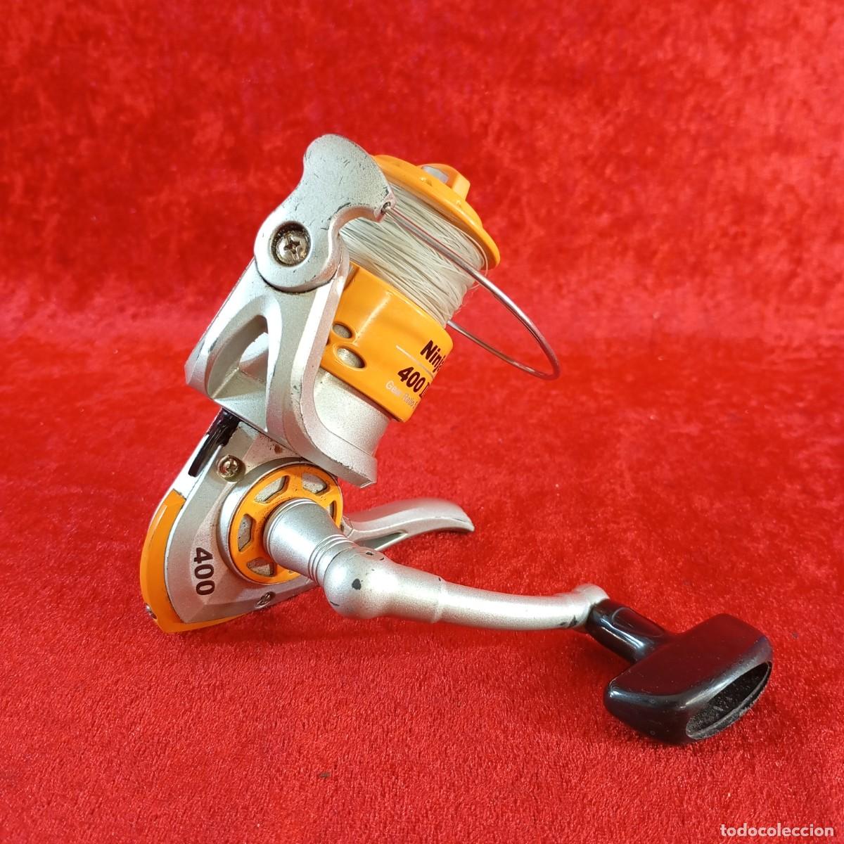 Coleccionismo deportivo: CARRETE DE PESCA GIRATORIO VINTAGE - NINJA 400 III - COLOR NARANJA Y PLATINO - 02