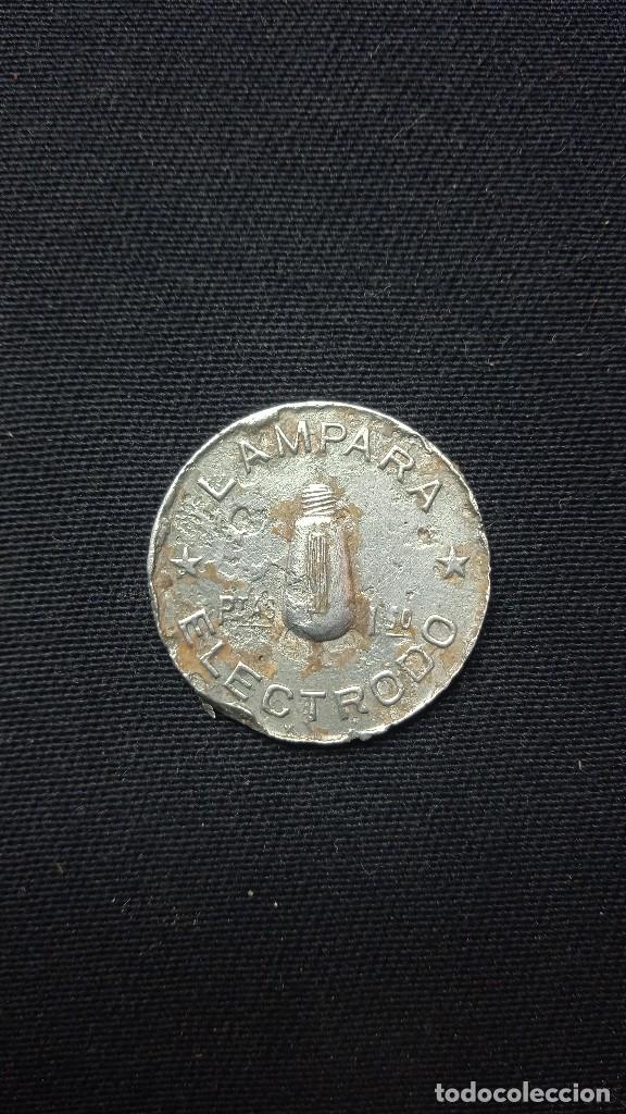 Material numism&aacute;tico: Ficha publicidad 1.30 pesetas - Foto 1
