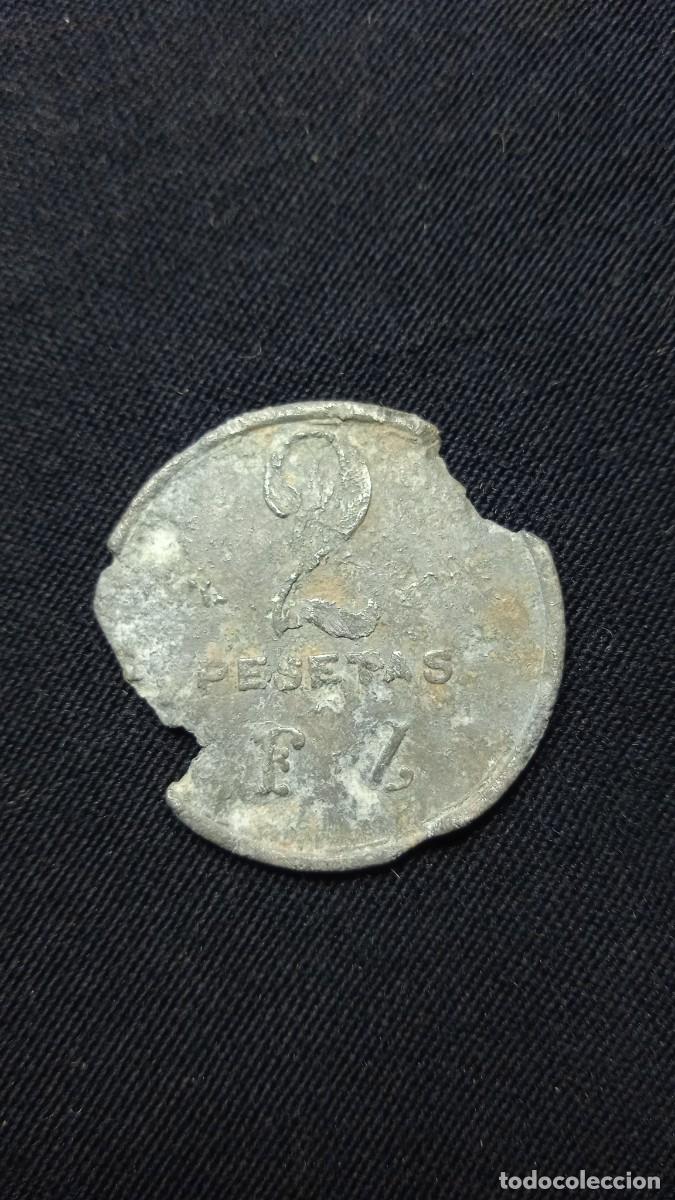 Material numism&aacute;tico: Antigua ficha publicidad 2 pesetas.