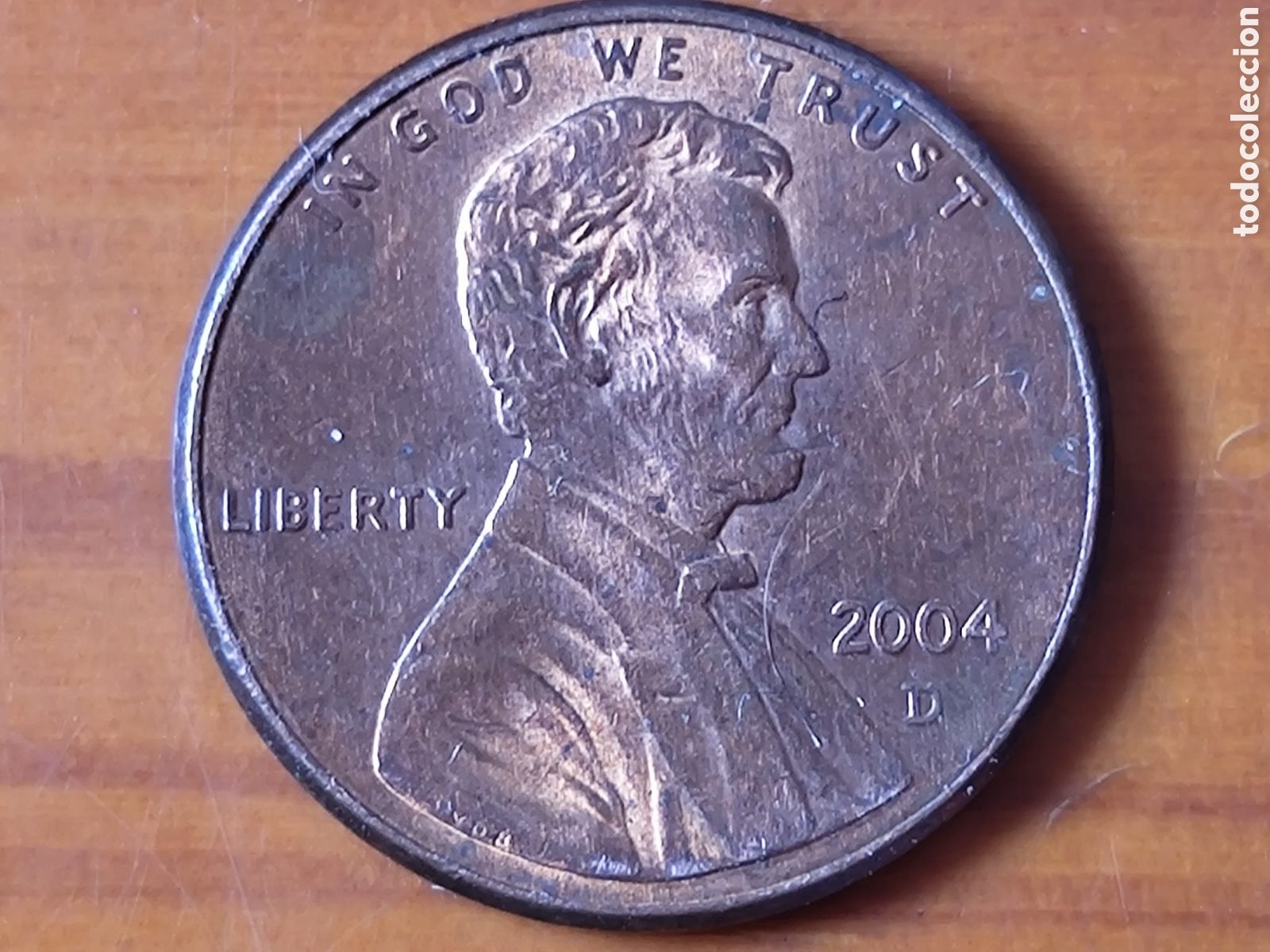 Material numism&aacute;tico: Moneda One cent 2004 AM pegadas