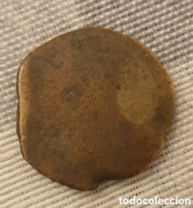 Mat&eacute;riel numismatique: Extra&ntilde;a moneda FELUS MARROQUI BRONCE S.XIII