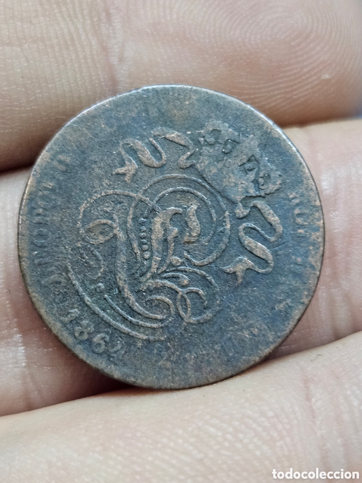 Materiale numismatico: MONEDA 2 CENT. 1864 L&rdquo;UNION FAIT LA FORCE