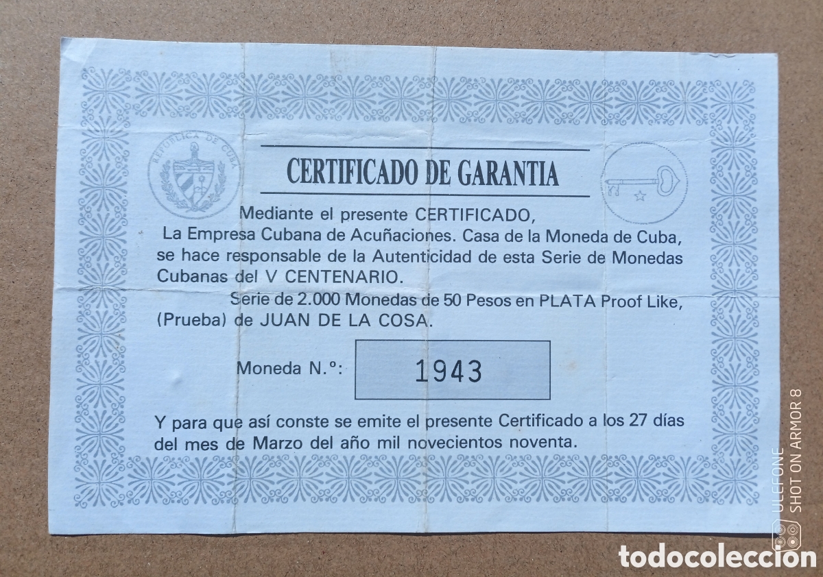 Material numism&aacute;tico: Certificado de garant&iacute;a de moneda de 50 Pesos 1990 - Juan de la Cosa.