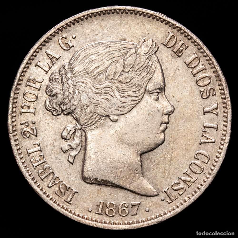 Material numism&aacute;tico: Isabel II (1833-1868). 2 escudos. 1867. Madrid. (Cal-647). Ag. 25,86 gramos. Suave p&aacute;tina. EBC/EBC+.