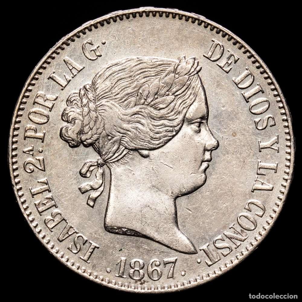 Material numism&aacute;tico: Isabel II (1833-1868). 1 escudo. 1867. Madrid. (Cal-565). Ag. 12,95 g. Ligeramente limpiada. EBC-.