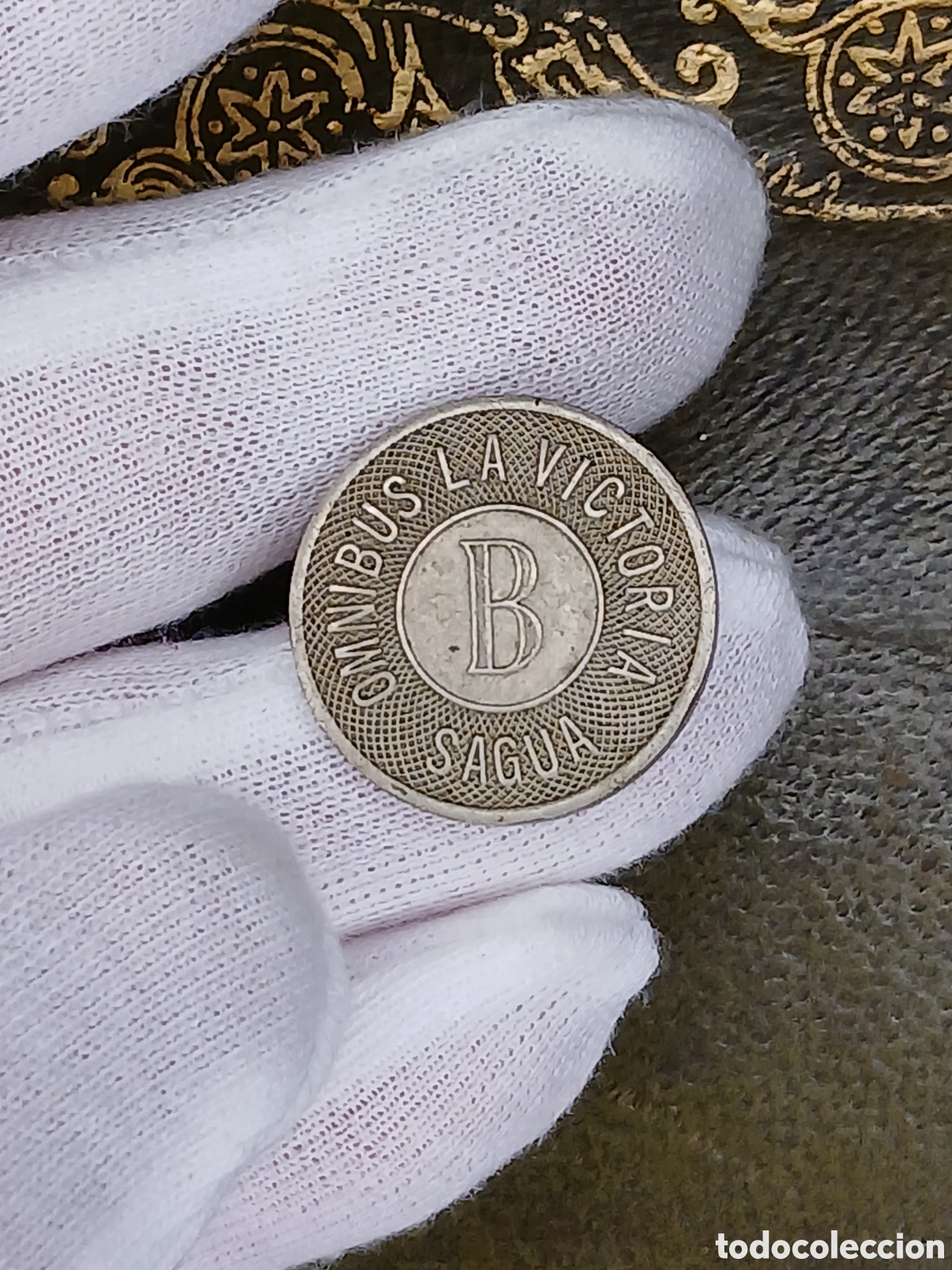 Material numism&aacute;tico: L170TK25.Cuba, ficha-token &Oacute;mnibus Sagua