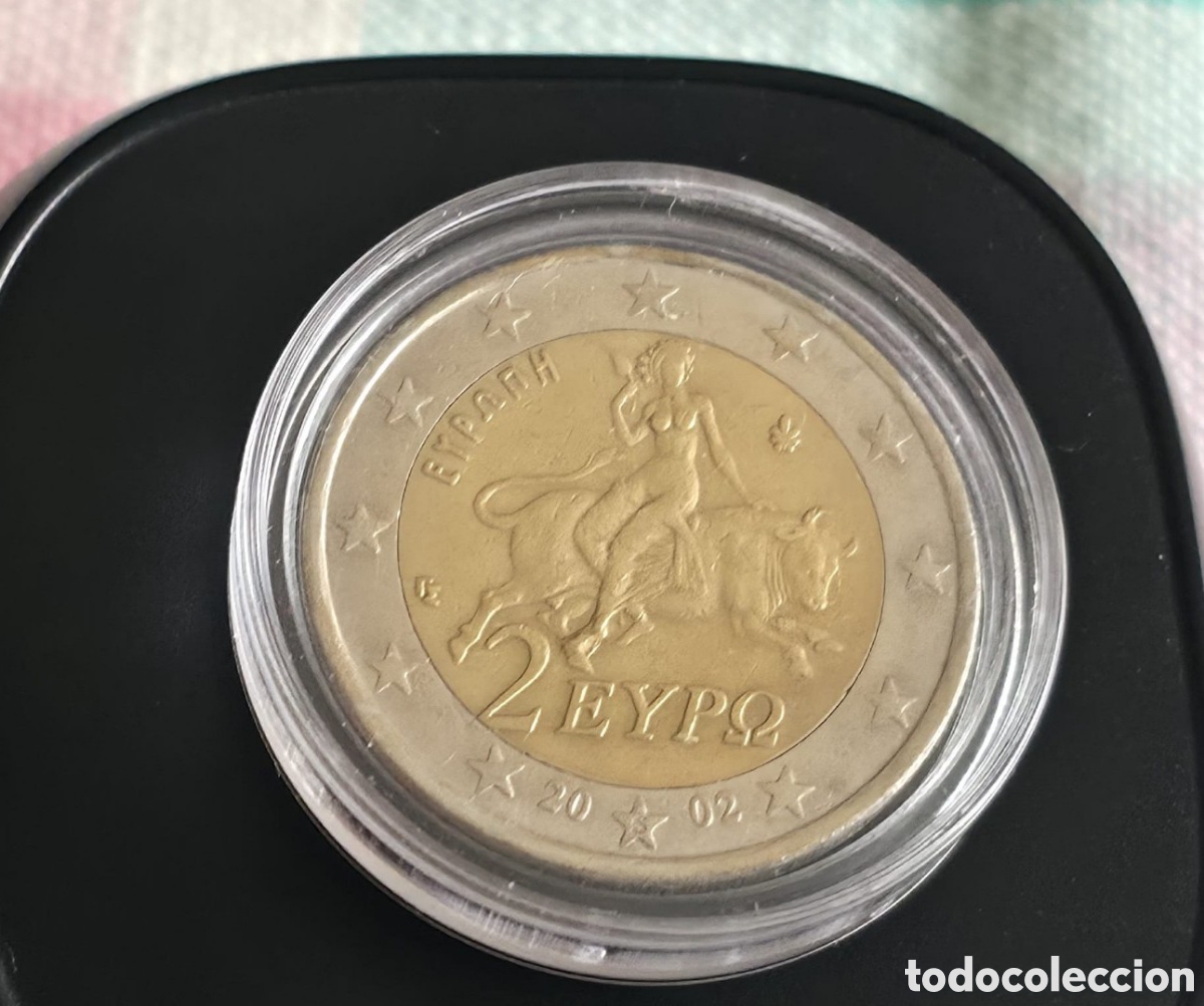 Material numism&aacute;tico: 2 euro donna seduta su toro con S. dentro stella.