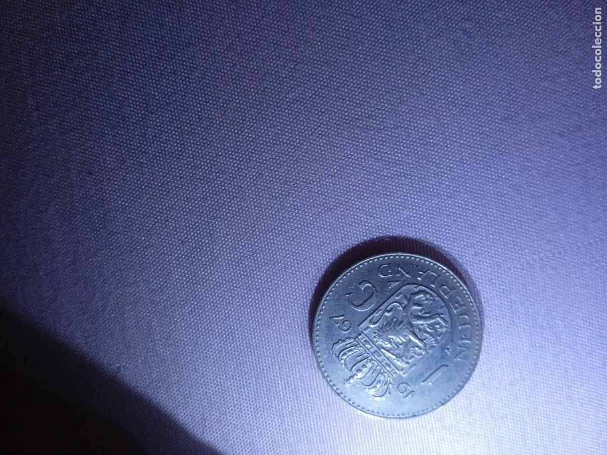 Material numism&aacute;tico: Monedas y estampillas