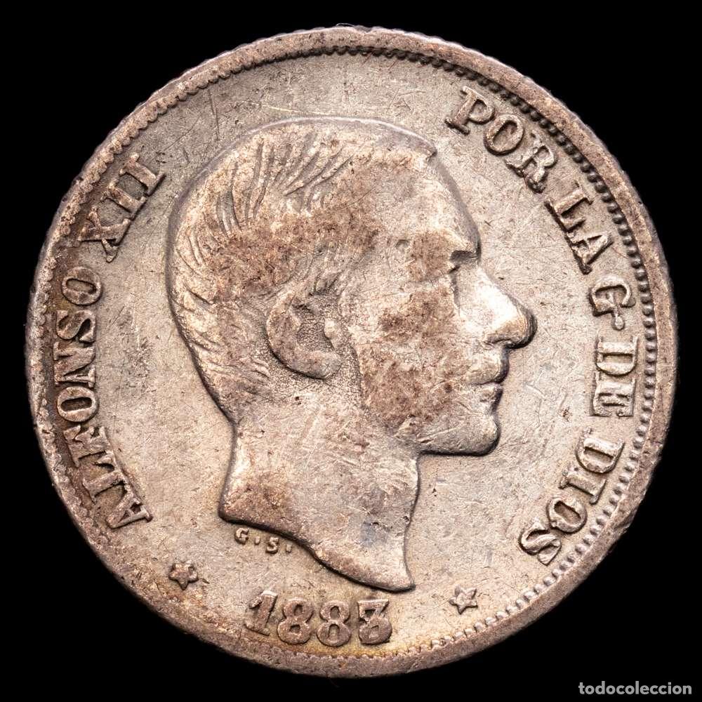 Material numism&aacute;tico: Alfonso XII (1874-1885). 10 centavos. 1883/2. Manila. (Cal-98). Ag. 2,56 gramos. Sobrefecha. MBC-.