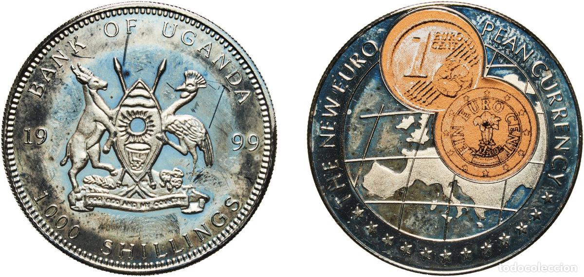 Material numism&aacute;tico: Uganda Republic 1999 1000 Shillings (1 Euro cent Austria) Copper-nickel (with paper applique-coin a