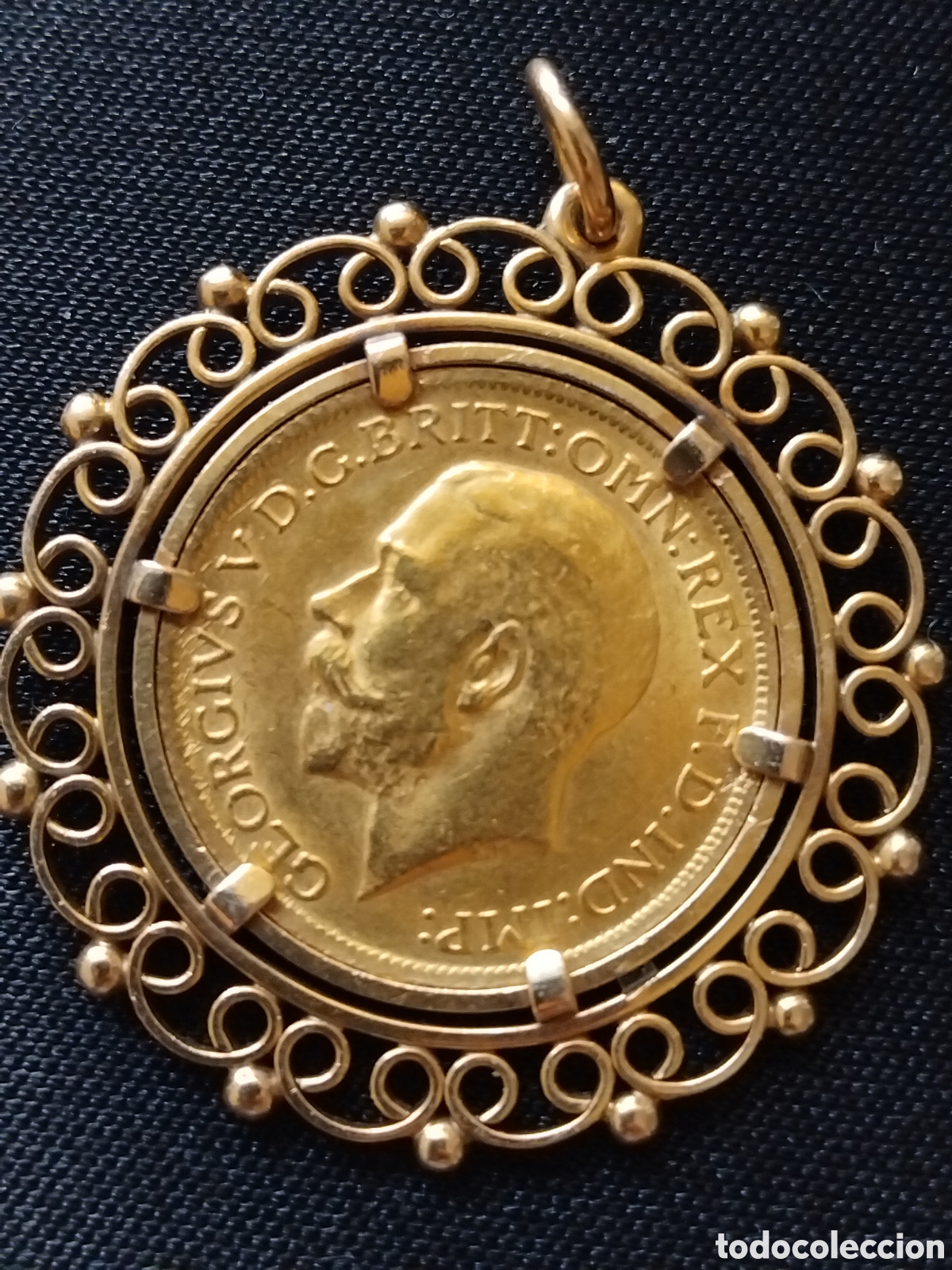 Material numism&aacute;tico: Colgante porta monedas