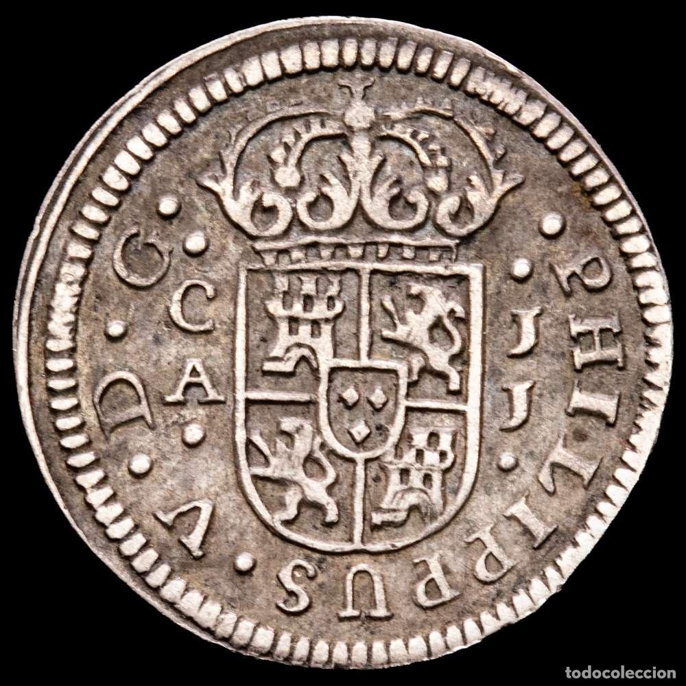 Material numism&aacute;tico: Felipe V (1700-1746). 1/2 real. 1719. Cuenca. J.J. (Cal-105). Ag. 1,22 gramos. MBC+. Suave tono.