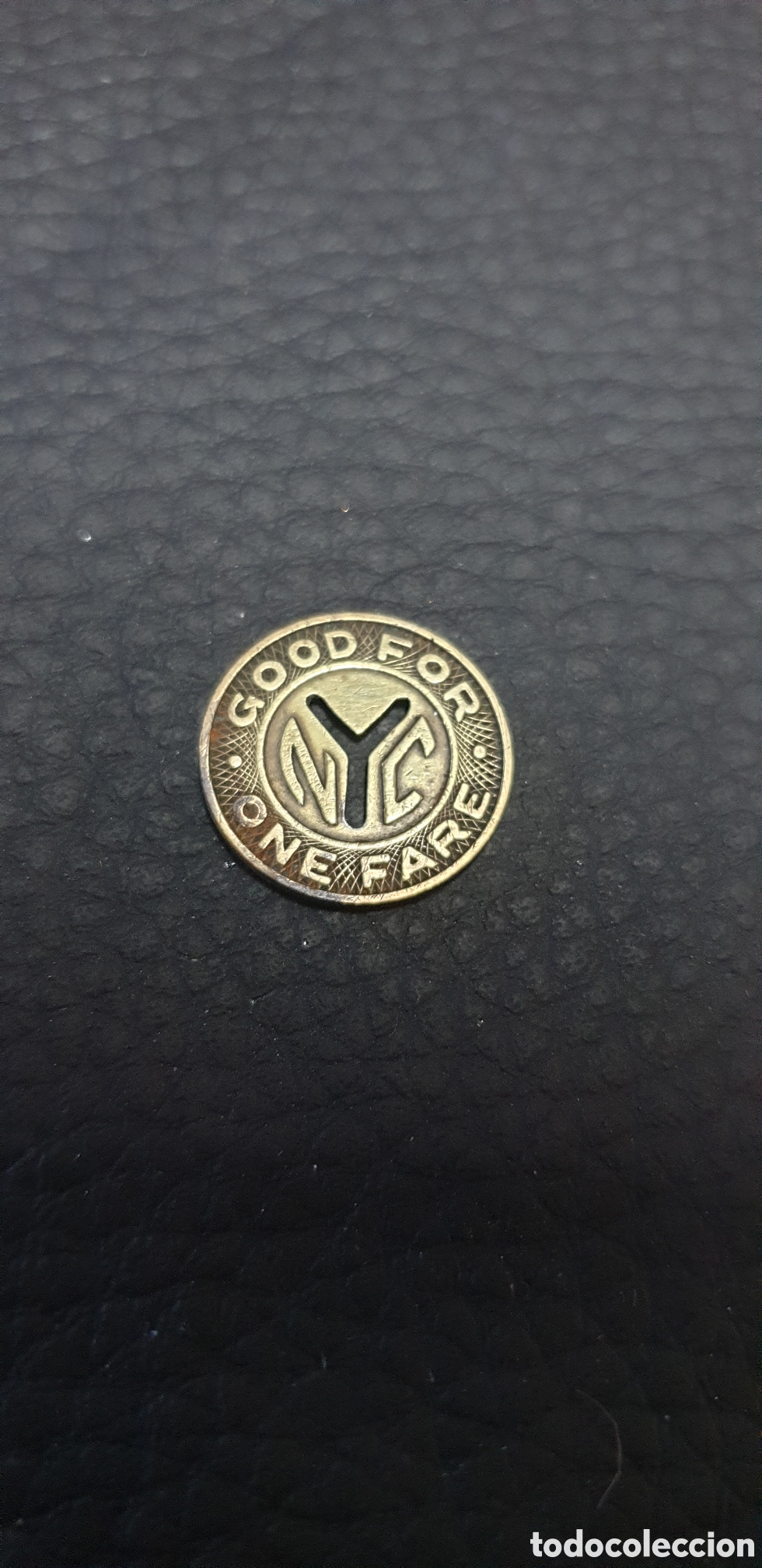 Materiale numismatico: ficha de transporte (token) del metro de la Autoridad de Tr&aacute;nsito de la Ciudad de Nueva York (New Yo