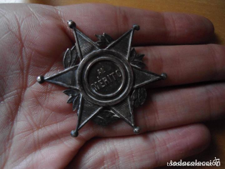 Medallas condecorativas: ANTIGUA MEDALLA AL MERITO - Foto 1