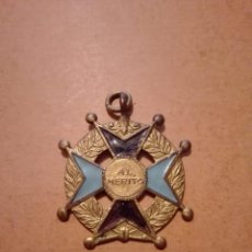 Medallas condecorativas: ANTIGUA MEDALLA AL MERITO