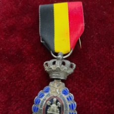 Medallas condecorativas: MEDALLA AL MERITO DEL TRABAJO(BEGICA)