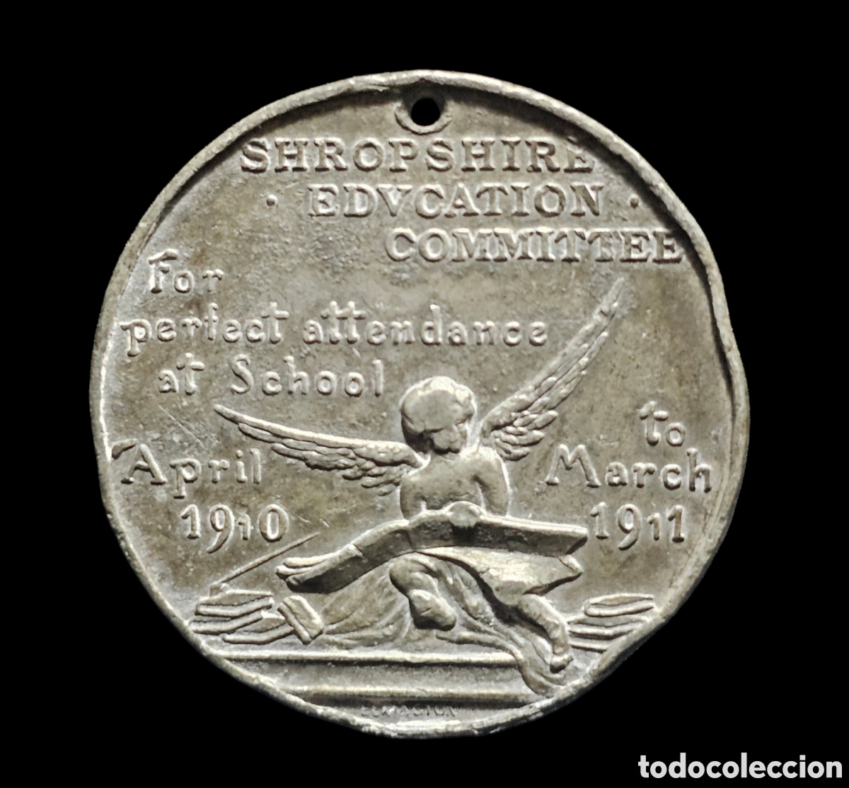 Medallas condecorativas: Medalla de asistencia escolar perfecta. A&ntilde;os 1910- 1911