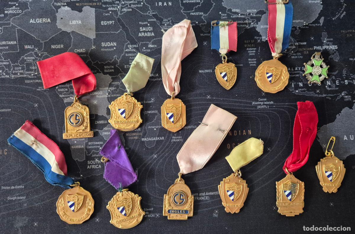 Medallas condecorativas: cuba lote de 12 medallas escuela 1950's