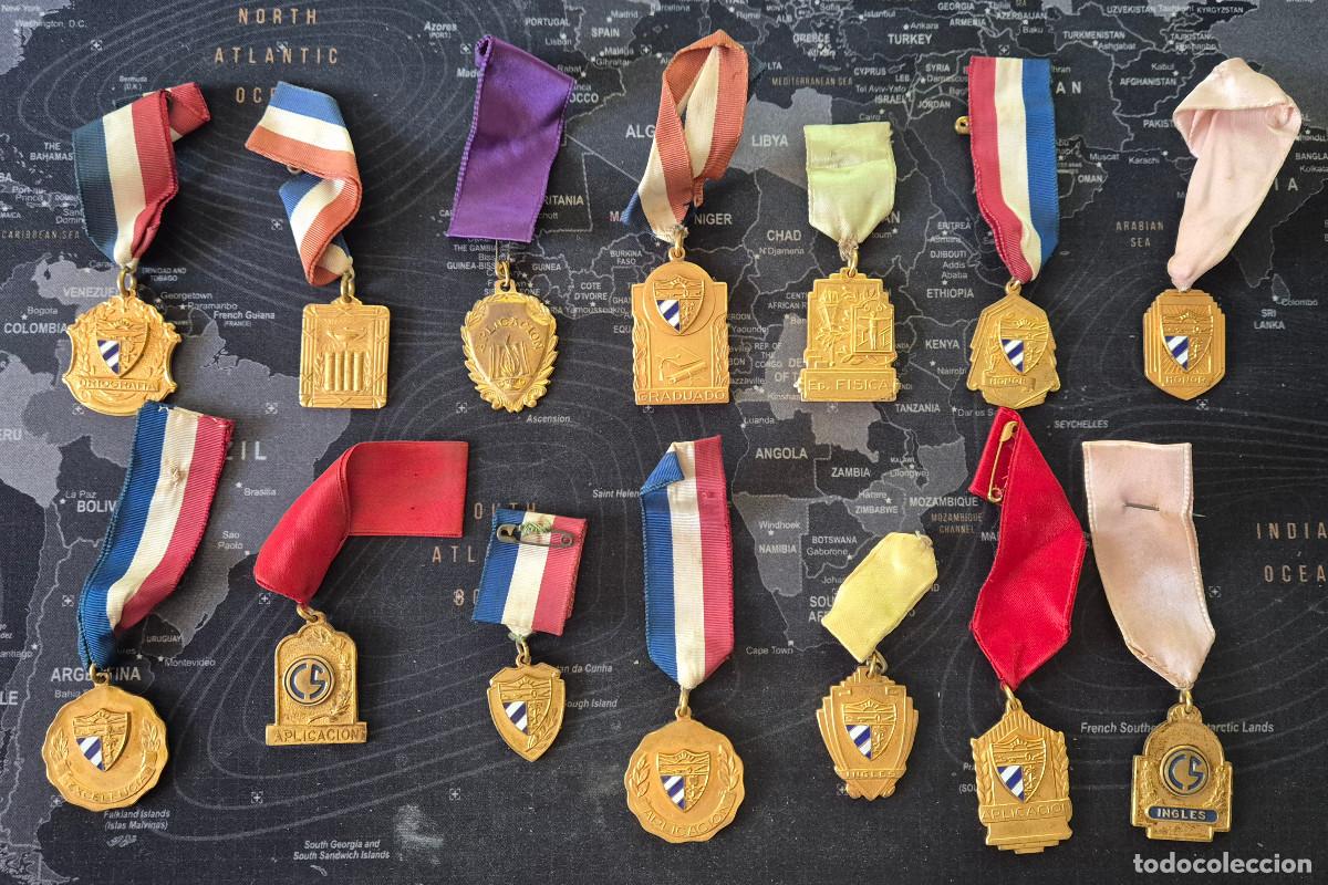 Medallas condecorativas: CUBA lote de 14 medallas escolares