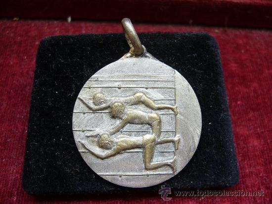 Sports collectibles: Medalla deportiva de Nataci&oacute;n